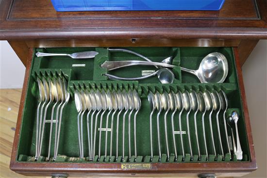 A service of Elkington & Co Dubarry pattern plated flatware in mahogany table canteen